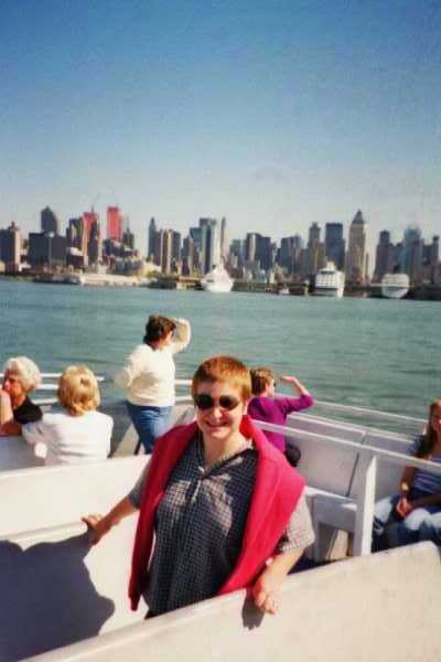 Model shown here with a fashionable pink sweater.